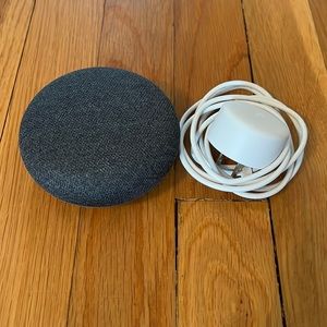 Google home mini 1st generation smart speaker with google assistant.
